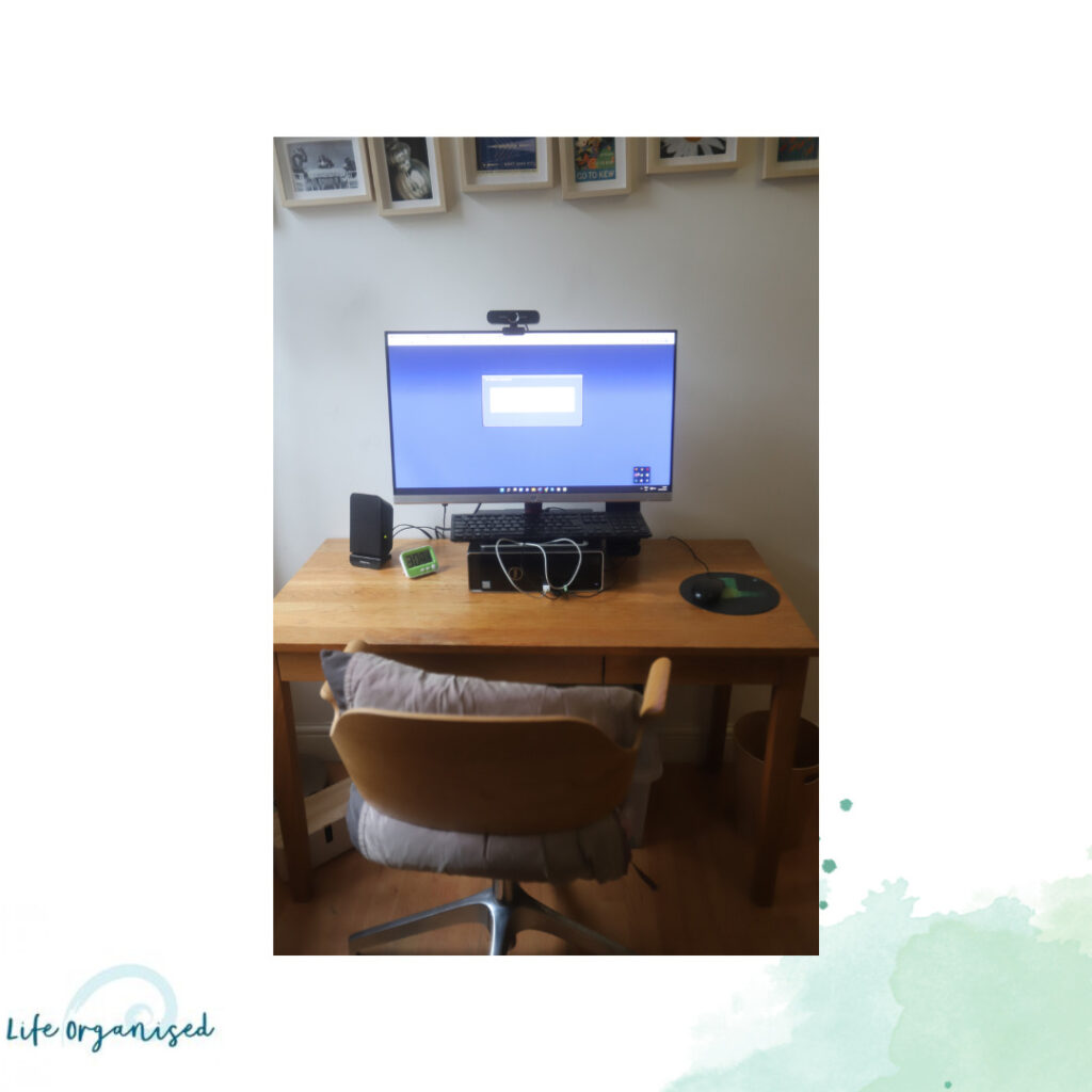 Desk with Computer showing five simple tips to organise your office