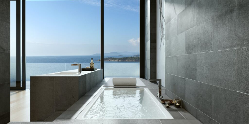 Minimalist bathroom with views of water