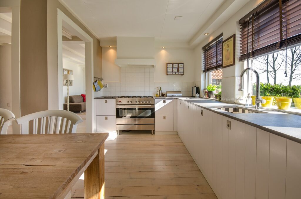 Kitchen with clear counter tops and clear dining table.