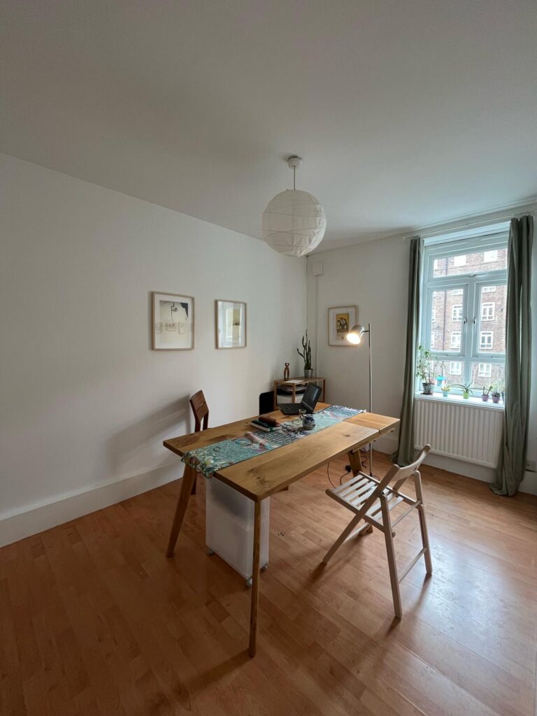 Table with chairs and computer