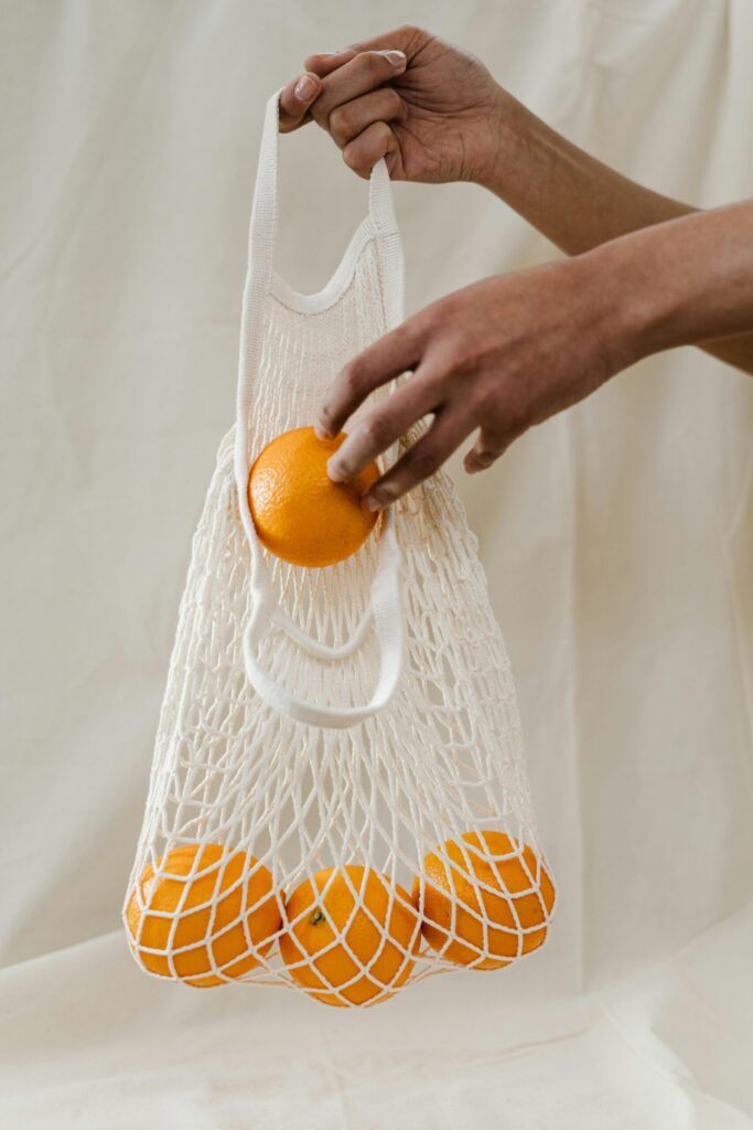 Oranges in reusable bag