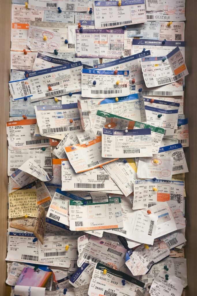 Wall full of plane tickets