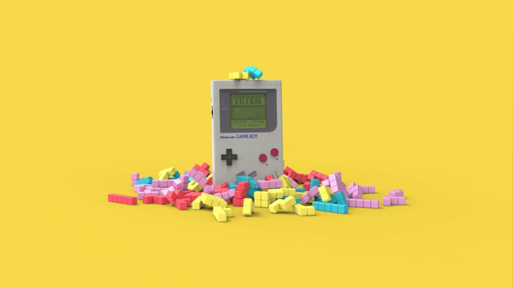 Late 1980s Gameboy with bricks symbolising Tetris.