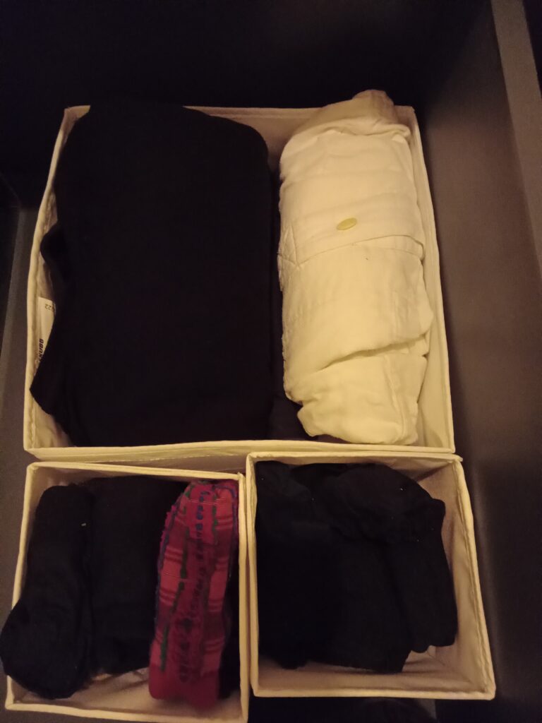 Folded clothing in boxes