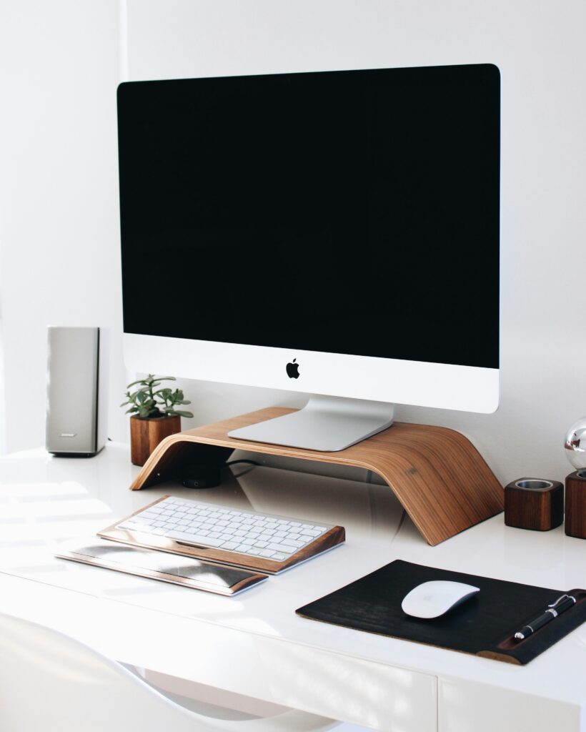 Apple desktop computer ona white desk