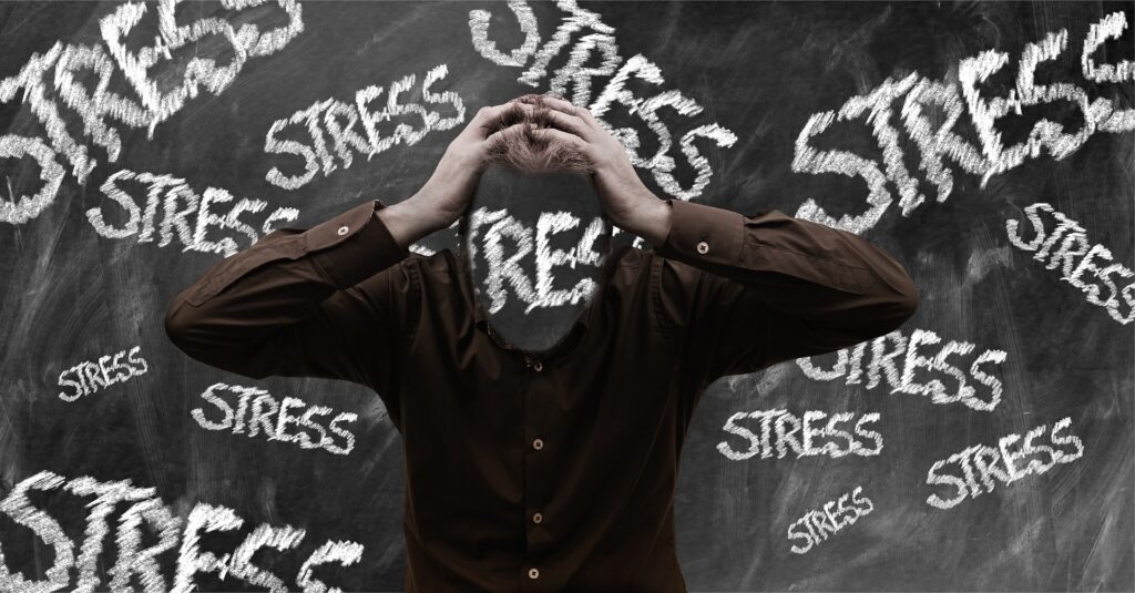 Person covered in the letters stress